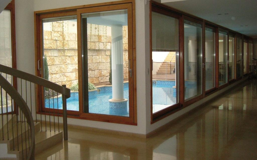 Finestre scorrevoli in legno e alluminio Solarium