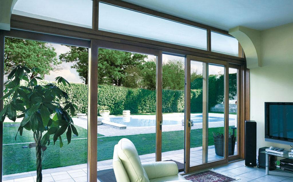 Infissi in legno e alluminio Solarium Scorrisolar
